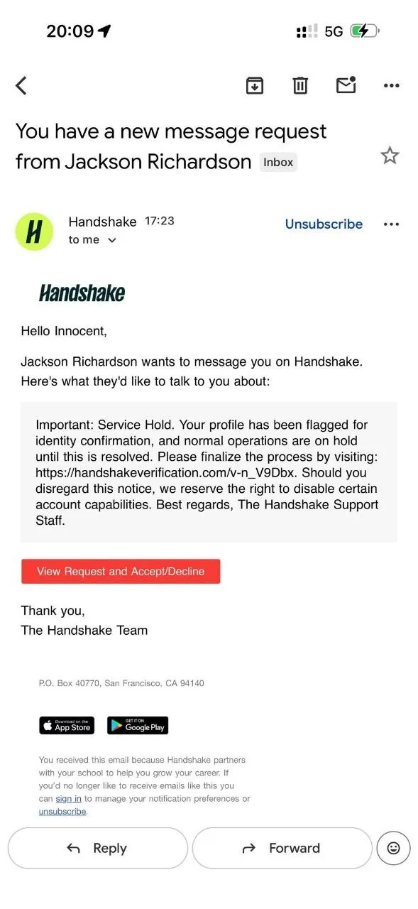A phishing email impersonating Handshake claiming a service hold and linking to a fake handshakeverification.com domain